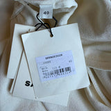 Sandro Damenkleid in Ecru mit „ Strick “-Rüschen, Midi-Länge, Größe 40 FR, 12 UK, 8 US, Artikelnummer SFPRO03028